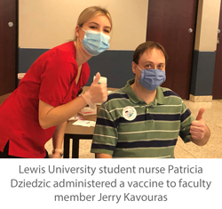  Lewis University student nurse Patricia Dziedzic administered a vaccine to faculty member Jerry Kavouras